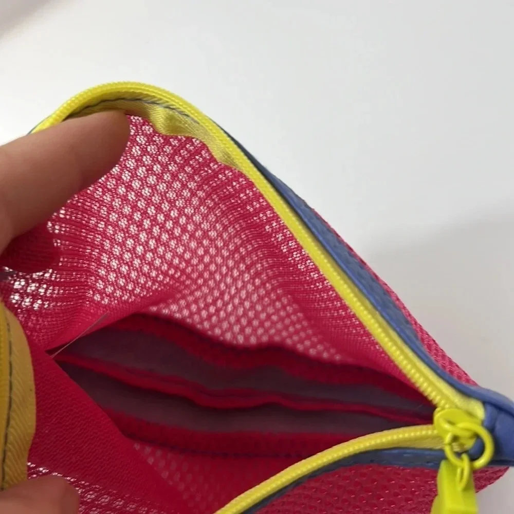 NWOT Pink Blue‎ and Yellow Mesh Makeup Bag